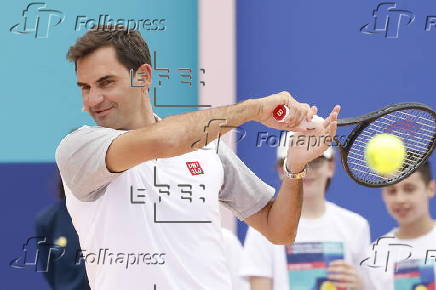 Tennis legend Roger Federer inaugurates tennis court in Paris suburb
