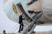 U.S. President Joe Biden boards Air Force One in Lima