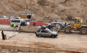 People who had fled the hostilities in Lebanon to Syria drive back with their belongings to Lebanon through the Masnaa border crossing between the two countries