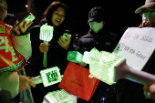 Protesters take part in a rally calling for the impeachment of South Korean President Yoon Suk Yeol, in Seoul