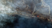 A satellite image shows smoke covering the Pacific Coast Highway along the Malibu coastline due to the devastating wildfires