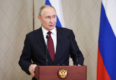 Russian President Putin attends a press conference in Astana