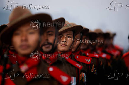 Members of Indian paramilitary force Assam Rifles march during a rehearsal for the upcoming Republic Day parade in New Delhi