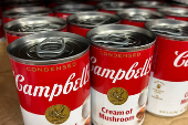 Cans of Campbell's cream of mushroom soup line a supermarket shelf in Bellingham