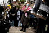 Protest in front of the residence of the University of Michigan's president in Ann Arbor