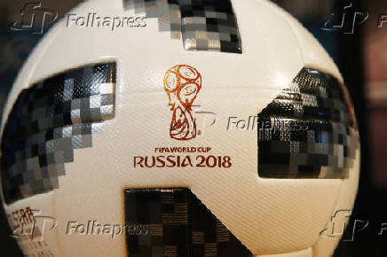 A soccer ball with the sign of the FIFA World Cup 2018 is seen before the Adidas annual news conference in Herzogenaurach