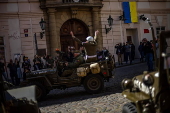 History enthusiasts participate in the 'Convoy of Liberty' in Prague