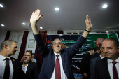 Presidential candidate, Abdel-Ali Hassani Cherif, greets his supporters during his campaign rally in Tizi-Ouzou