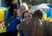 Ukrainian prisoners of war react after a swap, amid Russia's attack on Ukraine, at an unknown location in Ukraine