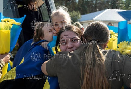 Ukrainian prisoners of war react after a swap, amid Russia's attack on Ukraine, at an unknown location in Ukraine