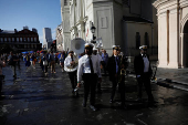 Members of the Perfect Gentlemen Social and Pleasure Club lead a second line parade in New Orleans