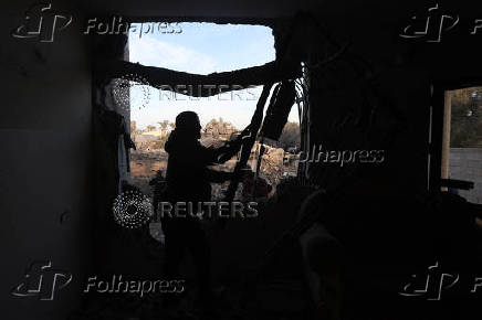 Aftermath of an Israeli strike on a house in Deir Al-Balah in the central Gaza Strip