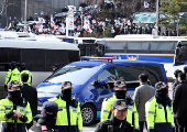 Impeached South Korean President Yoon Suk Yeol arrives at Seoul Western District Court in Seoul