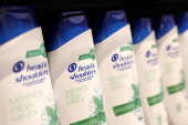 Head & Shoulders products are displayed on a shelf in a supermarket