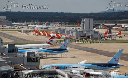 FILE PHOTO: British Airways, Easyjet and TUI aircraft are parked at the South Terminal at Gatwick Airport, in Crawley