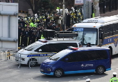 South Korea's impeached President Yoon Suk Yeol arrives for court