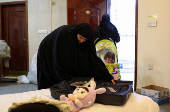 Displaced Lebanese, who had fled to Iraq, prepare to head back home after a ceasefire between Israel and Hezbollah took effect, in Karbala