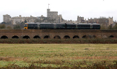 FILE PHOTO: A Great Western Railway train passes in front of Windsor Castle in Eton