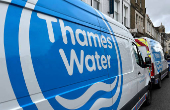 FILE PHOTO: Thames Water vans are parked as repair and maintenance work takes place, in London