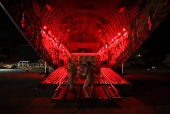 United Arab Emirates military personnel prepare palettes of aid for Lebanon, in Beirut