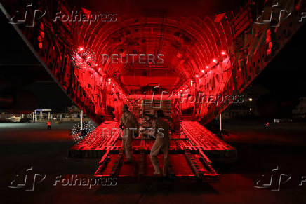 United Arab Emirates military personnel prepare palettes of aid for Lebanon, in Beirut