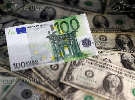 FILE PHOTO: U.S. dollar and Euro notes are seen in this picture illustration