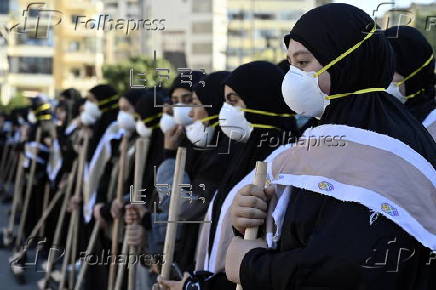 Hezbollah's Imam Al Mahdi Scouts clear debris in Beirut amid ceasefire with Israel