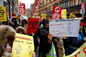 Harrods staff strike for Christmas bonus and better conditions.