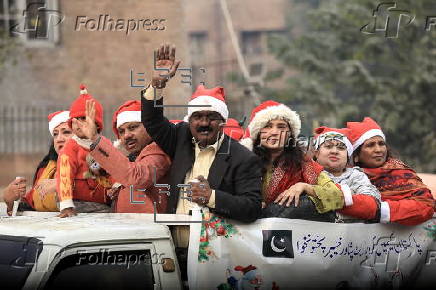 Pakistan's Christian minority dressed up as Santa hold rally in Peshawar