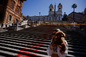 Activists pour red paint on the Spanish Steps to protest against femicides in Rome