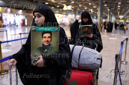 Displaced Lebanese, who had fled to Iraq, prepare to head back home after a ceasefire between Israel and Hezbollah took effect, in Najaf