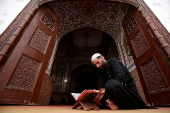 Muslims read from the Quran during Ramadan in Pakistan