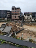A view of a bridge that collapsed amid heavy rains, in Xiaosanjiang town, Guangdong