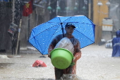 Red River overflows causing severe flooding in Hanoi following Typhoon Yagi