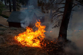 The Bridge Fire burns the mountain communities to the northeast of Los Angeles, in Wrightwood