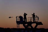 Members of security forces stand guard at Dane County Airport in Madison