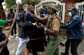 Kenyan activists and civil society representatives gather to deliver a list of people who disappeared during demonstrations against the government proposed tax hikes, in Nairobi