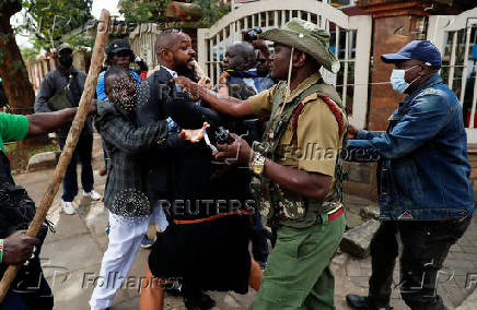 Kenyan activists and civil society representatives gather to deliver a list of people who disappeared during demonstrations against the government proposed tax hikes, in Nairobi