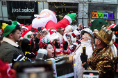 Revellers take part in SantaCon in New York City