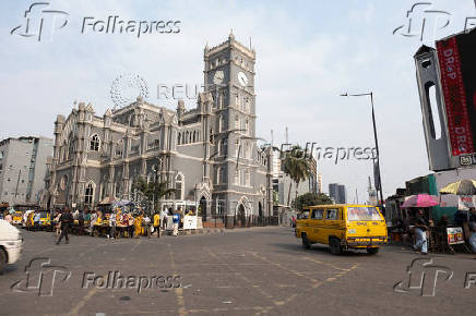 A vehicle drives past the Cathedral Church of Christ Marina in Lagos