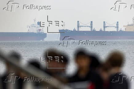 Cargo ships anchor in Chesapeake Bay following closure of Port of Baltimore