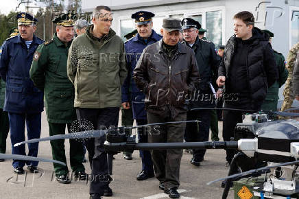 Russian Defence Minister Sergei Shoigu inspects drones in the Moscow military district