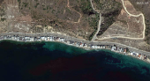 A satellite image shows the Pacific Coast Highway along the Malibu coastline before devastating wildfires