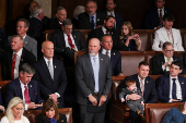 U.S. representatives gather to vote for their new Speaker of the House on the first day of the new Congress at the U.S. Capitol in Washington