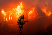 Palisades Fire burns during a windstorm on the west side of Los Angeles