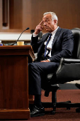 Robert F. Kennedy Jr., testifies before a Senate Finance Committee confirmation hearing, in Washington