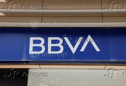 FILE PHOTO: The logo of BBVA is seen on the facade of a BBVA bank branch office in Malaga