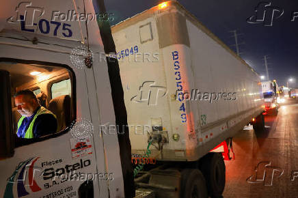 Trucks queue to cross into the United States at Zaragoza-Ysleta border crossing