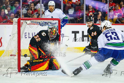 NHL: Vancouver Canucks at Calgary Flames