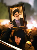 Supporters of Hezbollah Brigades protest against the killing of Nasrallah, in central Baghdad